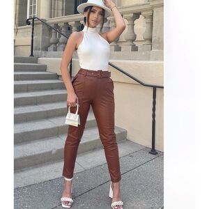 Fashion Nova belted leather pants